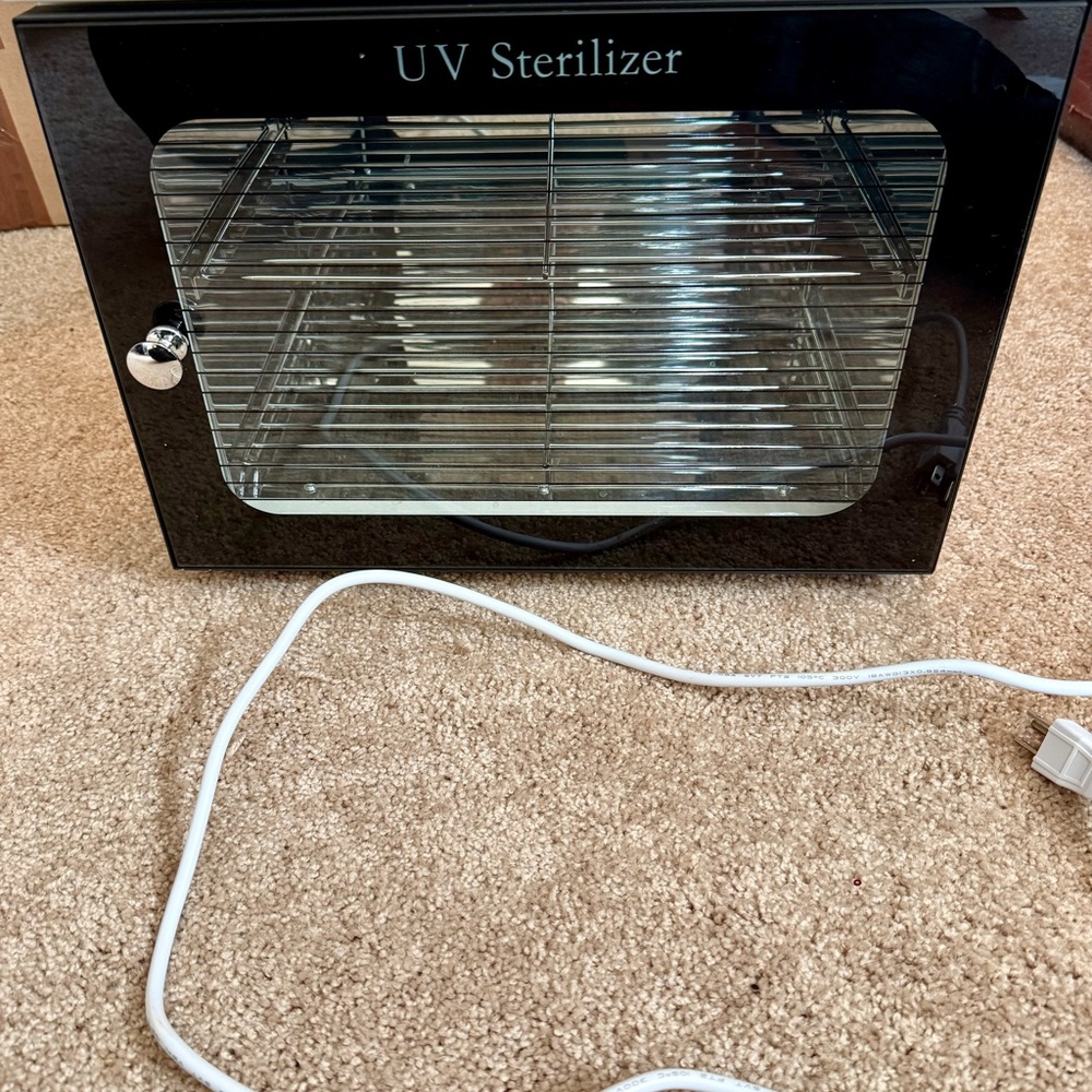 Black UV Sterilizer with Silver Interior